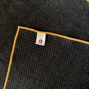 Manduka black yoga mat/towel